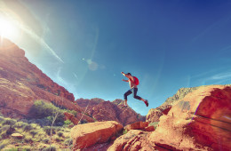 man person jumping desert