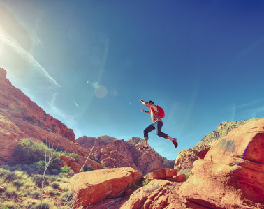 man person jumping desert