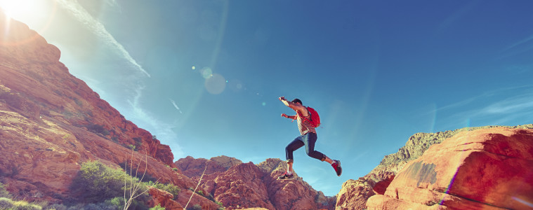 man person jumping desert