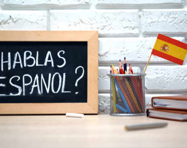 Do You Speak Spanish Written On Board, International Flag In Box, Language